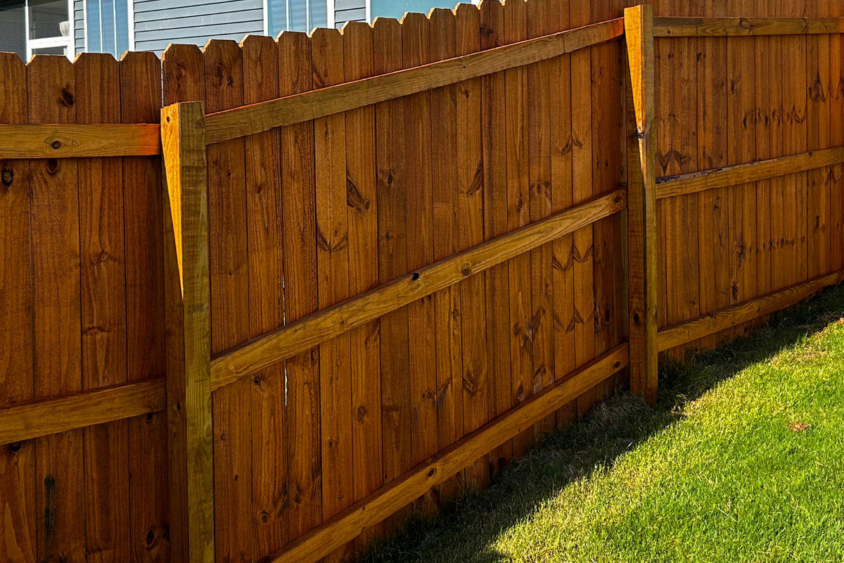 Stained fence in Greer, SC