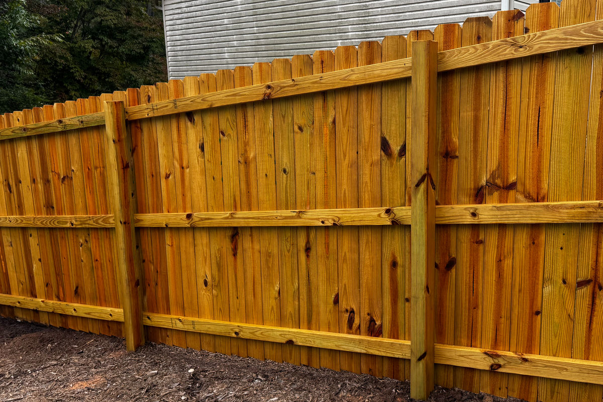Stained fence in Greer, SC